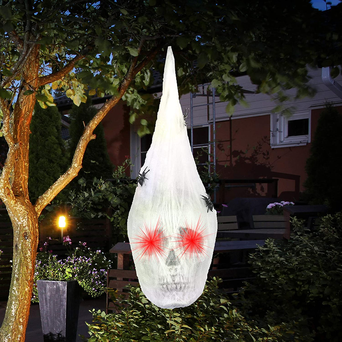 Petmoko Halloween Animated Hanging Skulls Head Covered with Spider Webs and Light Up Eyes, Halloween Hanging Decorations, Halloween Party Decorations, Outdoor Lawn Decor, Halloween Wall Hanging Decor
